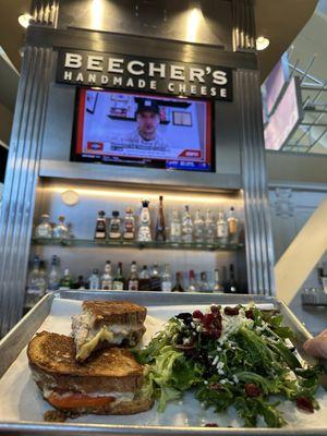 Turkey provolone sandwich with side salad