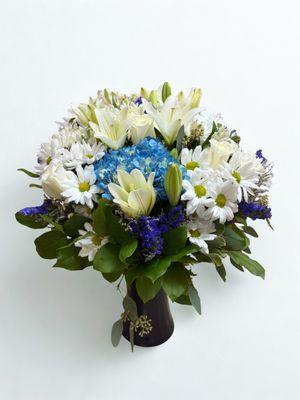 Holiday or winter vase arrangement