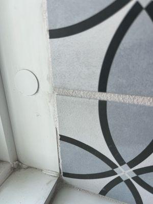 Showe tile next to window after it was "fixed" the 2nd time.
