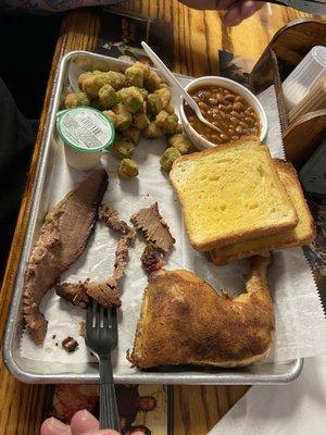 Pictured: Two meat platter with Brisket and chicken! With side of baked beans and okra!