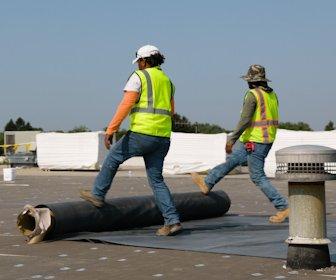 Rolling out our roofing membrane