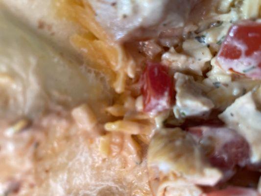 Sharp cheddar cheese not melted, less than 4 chicken