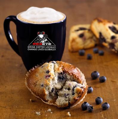 Enjoy a latte and freshly made muffin.