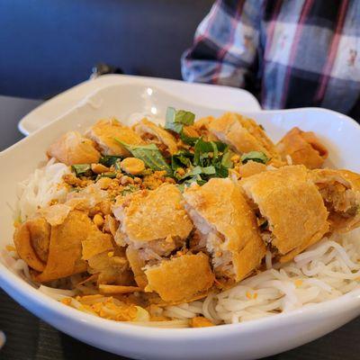 Rice noodle bowl with the eggrolls. Requested mint be added but they only had basil.  Still good!