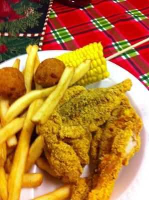 Two piece catfish with fries an corn,hush puppies