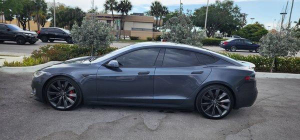 This is a pic of my car at their parking lot being inspected.