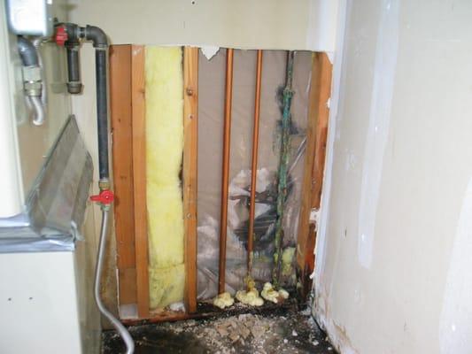 The green color pipe on the right had 12 screw holes in it that finally rusted out 14 years later, then I was called in to make the repair.