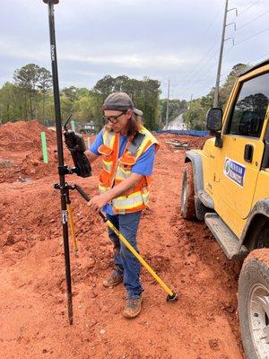 This is Mud laying out sewer junction boxes with his new Trimble R12 gps unit
