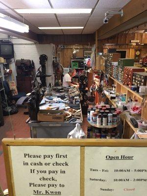 Mr. Kwon working in his shop.