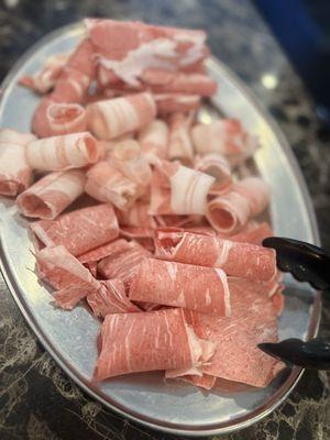 Ribeye, pork belly, lamb