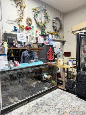 Joseph & interior view of front of shop