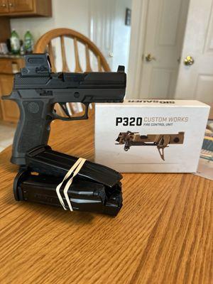 Sig P320c, trigger build kit, Holosun and Syndicate slide.  Can't wait to shoot this one!    Slightly used but a great price.