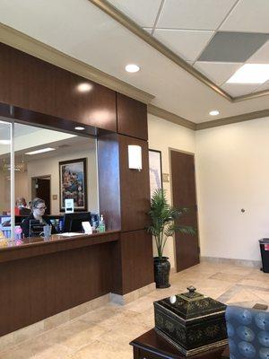 Receptionist's desk in Suite 150.