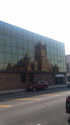 Cool Reflection Of A Church In The Mirrored Building Across The Street.