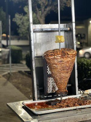 Al Pastor Trompo for show. They don't vertically slice it seems; instead you'll get chopped up little pieces.