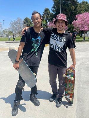 Coach Mike teaching his student at Harbor Skate Park.