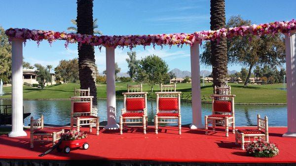 Trying not to block the view but still look like' here's the ceremony!'
