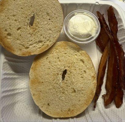 Bagel with cream cheese with side bacon