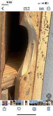 Busted two by fours all over our roof where they took shovels and aggressively removed the shingles