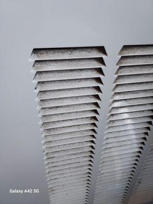 Vent right next to the bed.