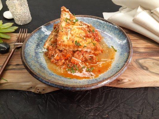 Turkey bolognese GF Slow cooked with san marzano tomato and oregano. Served with seared polenta