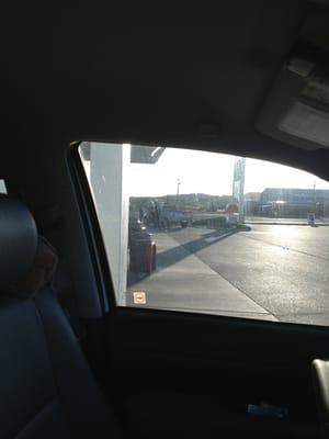 Cop talking to a truck in the parking lot