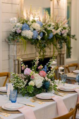 Head table florals at French Farmhouse. Wedding flowers provided by Town and Country Floral in Granbury Tx