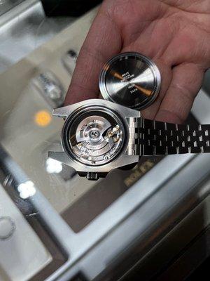 Rolex GMT Master II case back removed to show the 3285 movement.