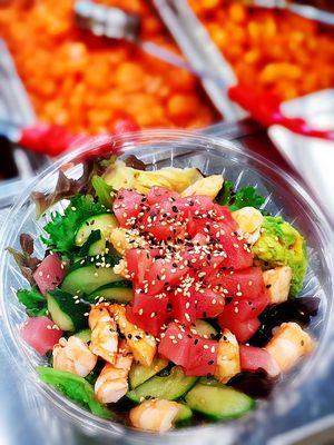 Ahi tuna and shrimp poke bowl made by one of our staff