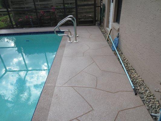 Natural stone design & heavy border acrylic pool deck
