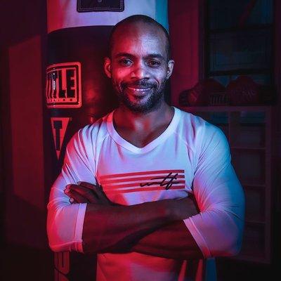 NYC boxing and fitness instructor, Ralph A. Gilmore, poses for photo shoot. Photography done by Work Train Fight gym owner, Alberto Ortiz.