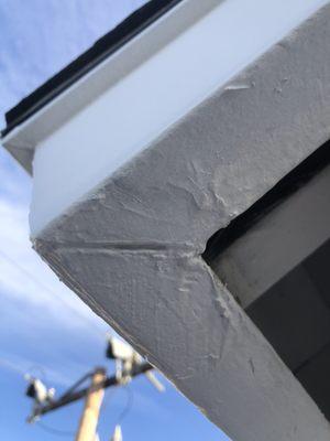 Painted over damage which should have been sanded/bondo'd