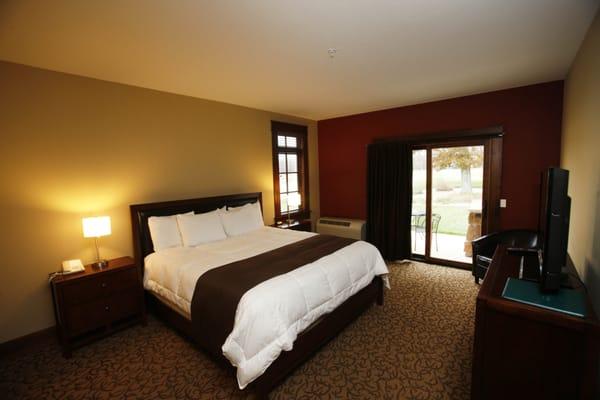 Standard king room on course side.