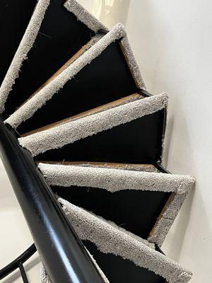 Poorly installed carpet. One section will quickly become a tripping hazard.