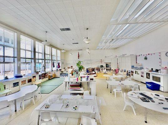 One of the preschool classrooms - organized, clean, set stations with circle time then schedules for the students work/walk/project day