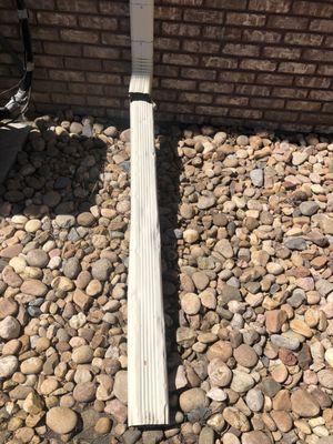 Downspout damage before replacement
