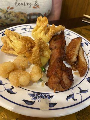 Cheese wontons, peanut chicken, chicken on a stick, salt and pepper shrimp.