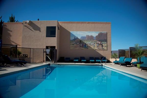 Lounge by the pool with a beverage and appetizer from Moki's, our onsite restaurant.