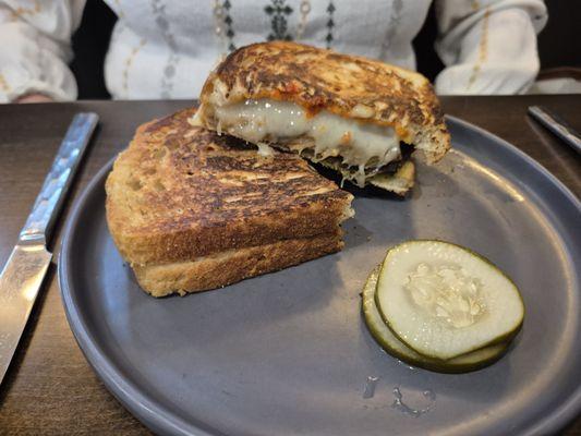 SMOKED EGGPLANT - 
 dill-sunflower pesto, chickpeas,
 ricotta, fig leaf, sunflower shoots