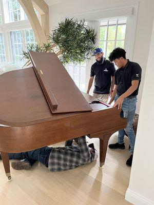 Setting up a Baby Grand Piano after moving it