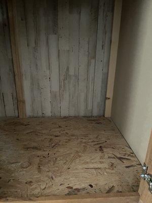 The cabinets don't have backs and are made with exposed partial board