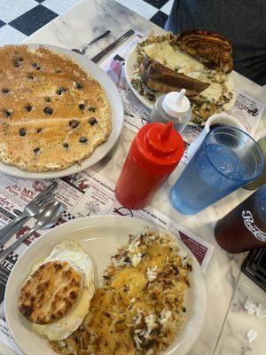 Breakfast sandwich, hash browns, dolly cake, the mess