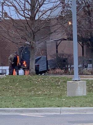 That's a serious smoker fired up out back. Must try what they are cookin!!