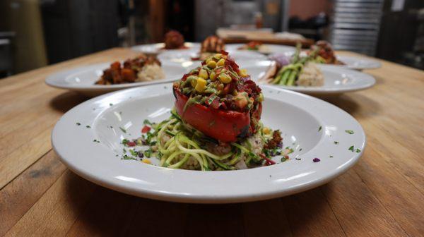 Tex Mex Stuffed Pepper -
Our Signature Ground turkey topped with our in house avocado creme stuffed inside of a bell pepper.