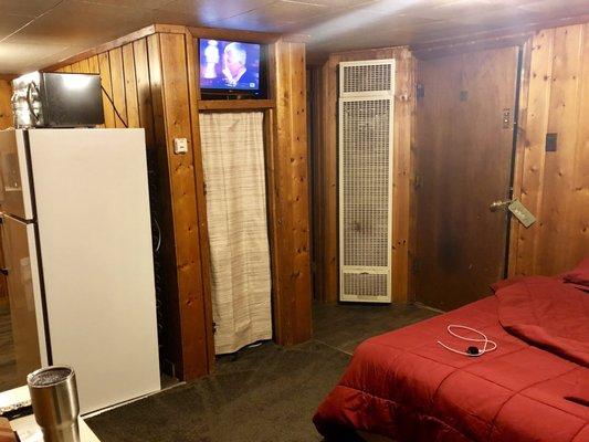 Corner heater / TV location / shag rug