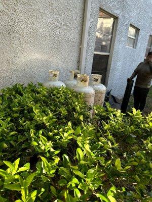 Gas Tanks next to windows and buildings. No regards of hazard safety.