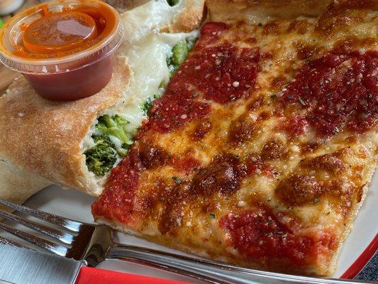 The fantastic grandma's pizza on the right and the broccoli stuffed calzone on the left with it's marinara dipping sauce