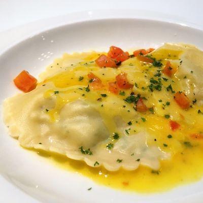 Shrimp and crab ravioli in saffron buerre sauce