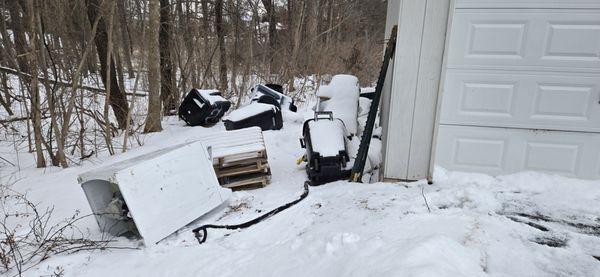 Trash cans and other garbage outside our apartment