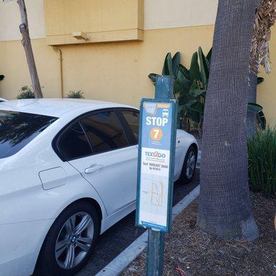 Sign with pick up location and clearly a large 7 on it.